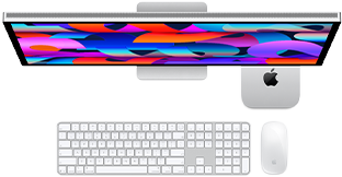 Mac mini smješten ispod Studio Displaya, Magic Keyboard s numeričkom tipkovnicom, Magic Mouse