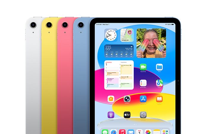 Perangkat iPad berderet dalam empat warna, perak, kuning, pink, biru, sementara layar menampilkan wallpaper dan berbagai aplikasi