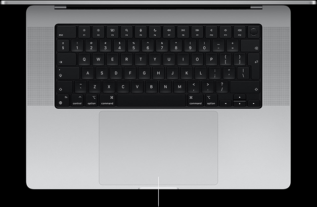 Top-down view of open MacBook Pro 16-inch showing Force Touch trackpad located below keyboard