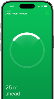 iPhone, Find My app on screen, text reads: Finding Living Room Remote, circular locator ring with bright arc pointing toward the remote's direction, text reads: 24 metres ahead