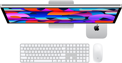 Mac mini під StudioDisplay, клавіатура Magic Keyboard із цифровою панеллю, миша Magic Mouse