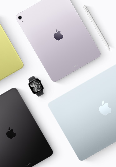 Vista desde arriba de dispositivos Mac y iPad de diferentes colores, con un Apple Watch negro en el centro.
