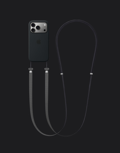 銀色 iPhone 17 Pro 機身背面，搭配黑色 MagSafe 矽膠保護殼，並掛上深灰色斜背掛繩