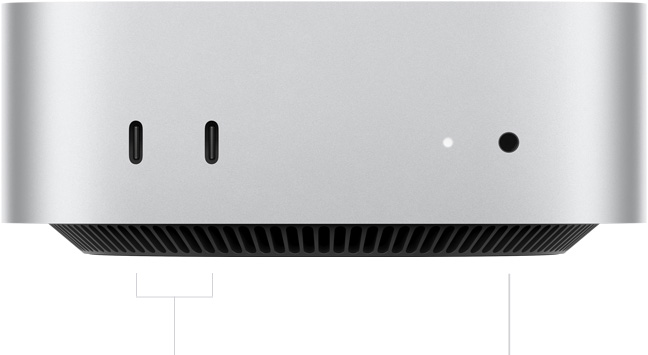 جهاز Mac mini، الجهة الأمامية، 2 من منافذ ثندربولت، ضوء مؤشر التشغيل ومقبس لسماعات الرأس، قاعدة سوداء مدببة في الأسفل، سطح مسطح، جوانب مدورة، حواف مستقيمة، لون فضي